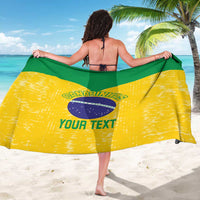 Brazil volleyball sarong with green top, yellow bottom, and dark circular logo print