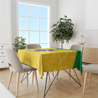 Yellow volleyball tablecloth over table with green side panel and circular center design
