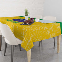 Yellow volleyball tablecloth with green edge and circular logo at center