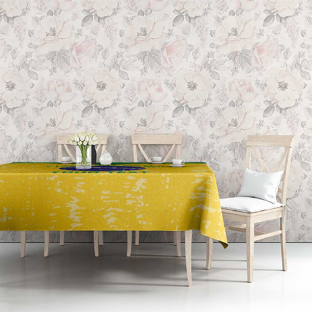 Yellow volleyball tablecloth on dining table with circular emblem