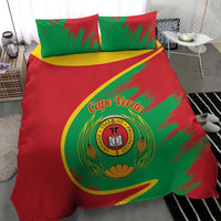 Cape Verde bedding set close-up: red duvet with green panel, coat of arms logo