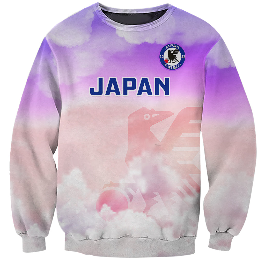 Pastel watercolor style sweatshirt with JAPAN graphic and crest on front