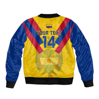 Back of yellow, blue and red football bomber jacket with number 14 and flag patch