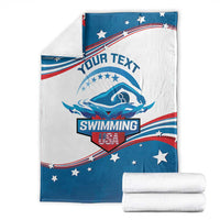 Personalized swimming blanket, folded blue-and-white with “YOUR TEXT” swim design