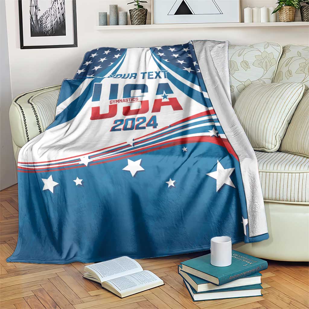 Personalized USA gymnastics blanket on bed, curved USA flag design in blue, white, red