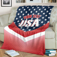 Custom USA shooting blanket draped over couch; navy star field with “YOUR TEXT USA”