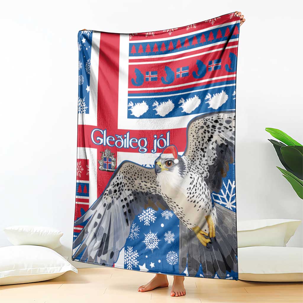 Blue and red Christmas blanket with gyrfalcon, snowflake pattern, and Nordic motifs