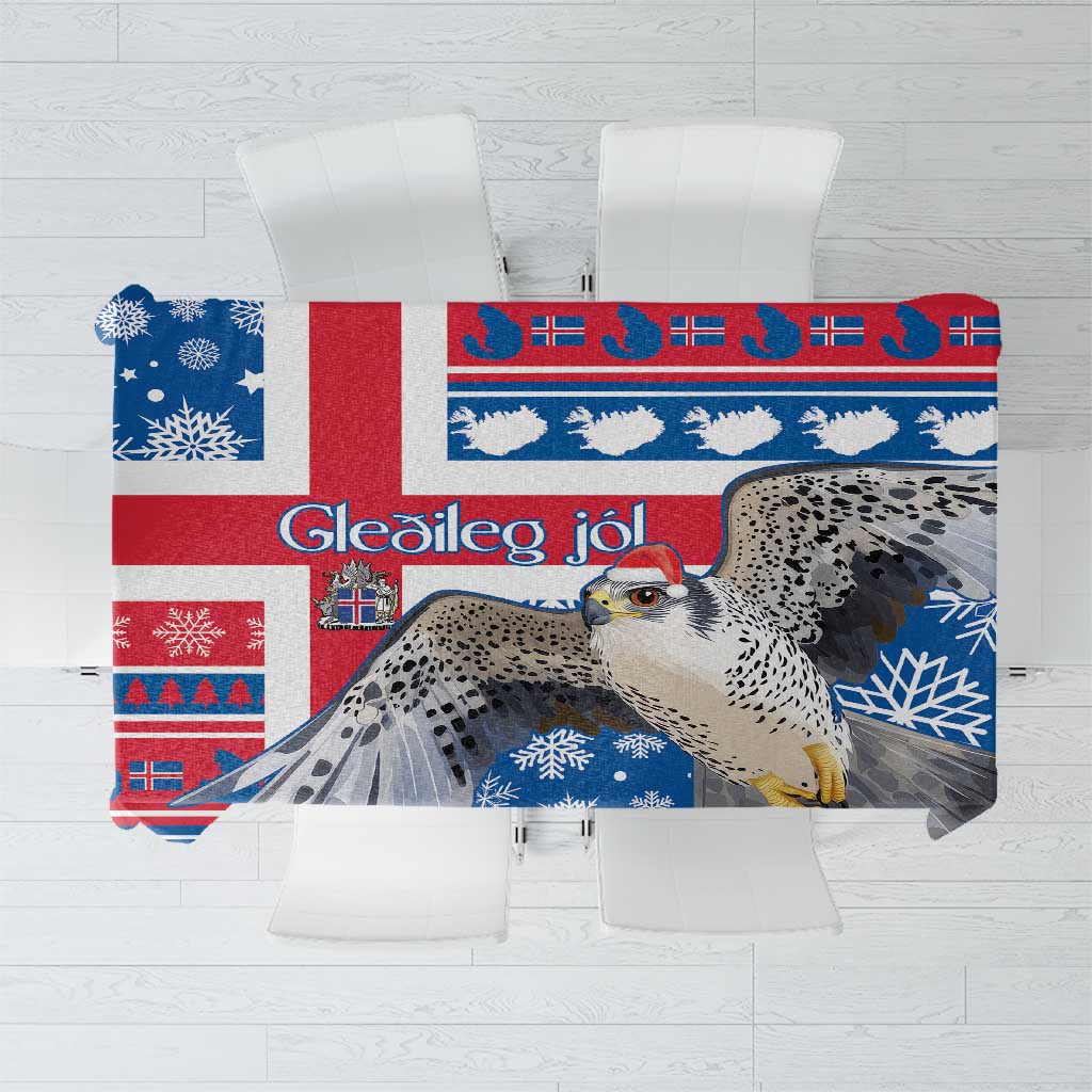 Blue holiday tablecloth with snowflakes, red panels, and a bird graphic