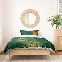 Green duvet cover with gold crest and leaf pattern, 'YOUR TEXT' on center