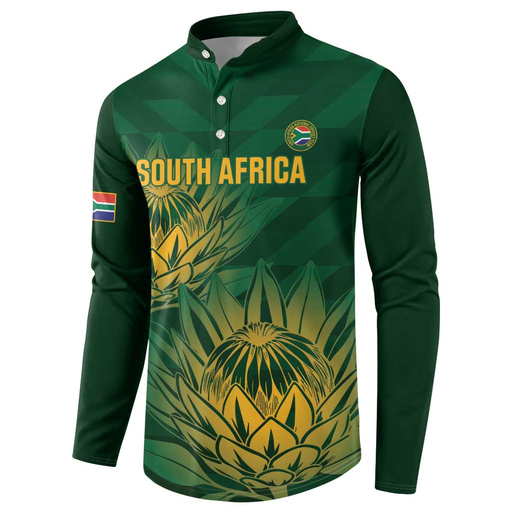 Green button sweatshirt front graphic with crest badge and South Africa text