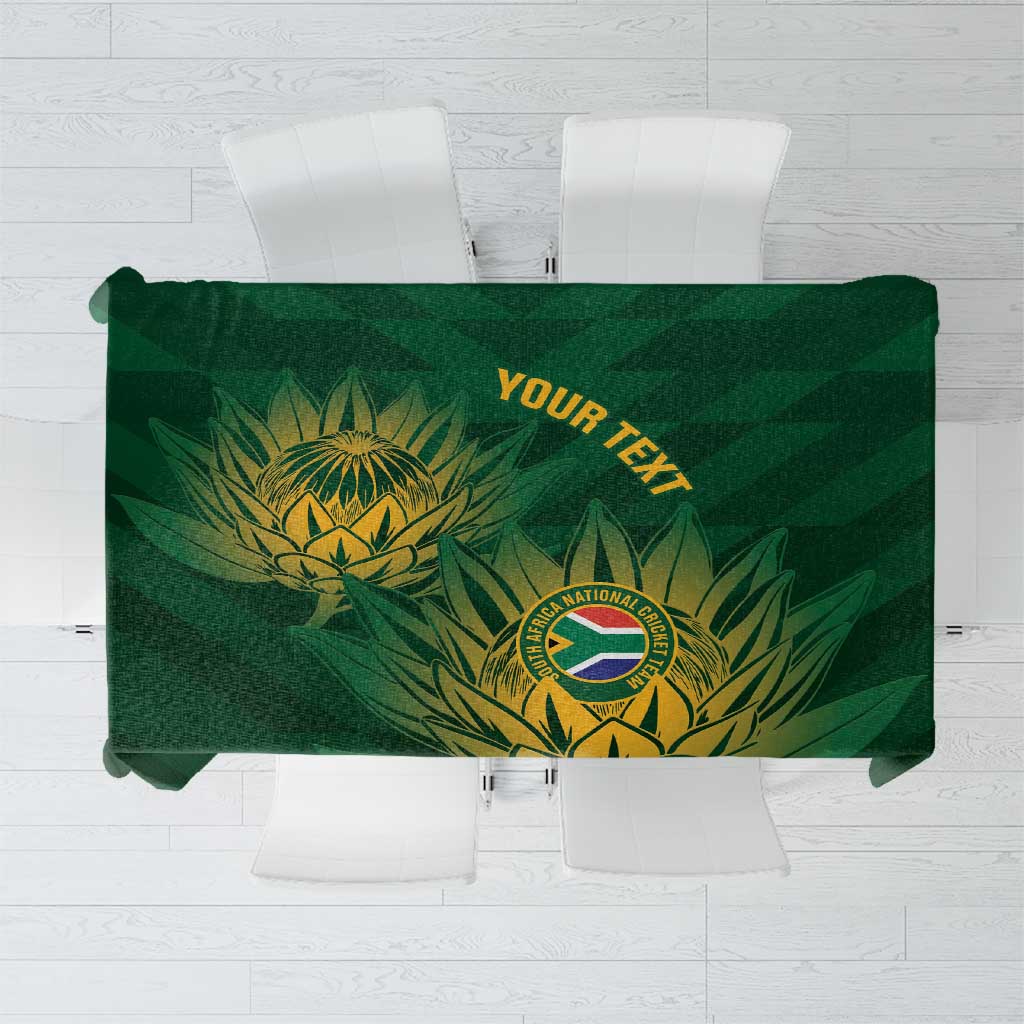 Green cricket-themed tablecloth with gold crest, foliage, and customizable text panel.