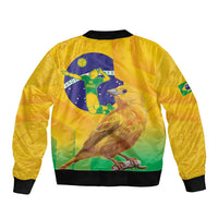 Yellow unisex bomber jacket with bird artwork, ribbed cuffs, and full-zip front