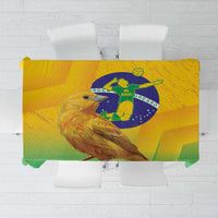 Yellow and green printed volleyball tablecloth with bird and globe artwork.