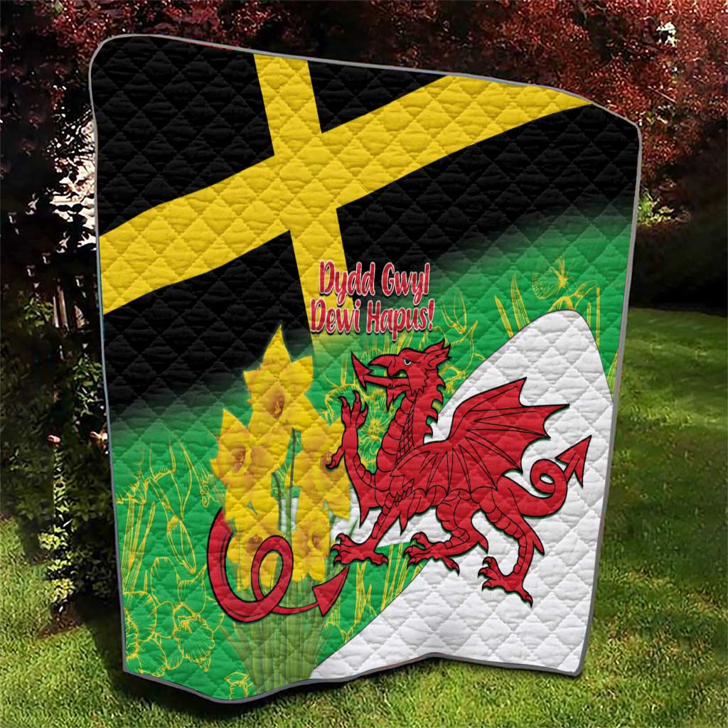 St David's Day quilt angled view with green, yellow cross, red dragon, black and white blocks.