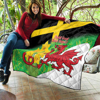 St David's Day quilt held up outdoors with green fabric, yellow cross, red dragon artwork.