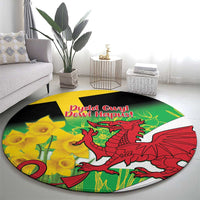 Round green decorative rug with red dragon, yellow daffodils, black border