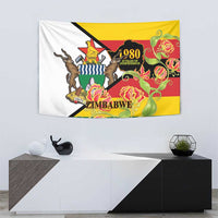 Zimbabwe independence tapestry on wall, white fabric with black border, roses and Zimbabwe text