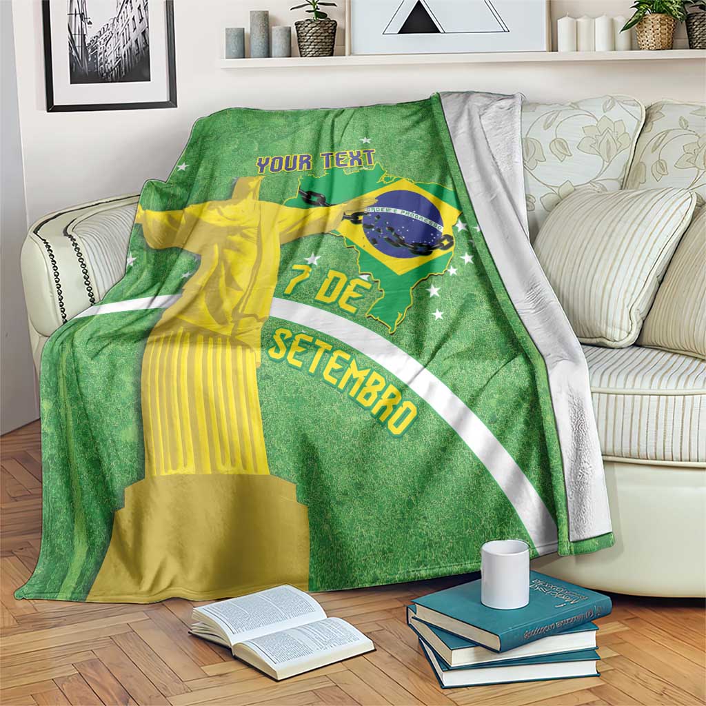 Green personalized blanket draped on couch with Brazil map, Christ, and 'YOUR TEXT' design