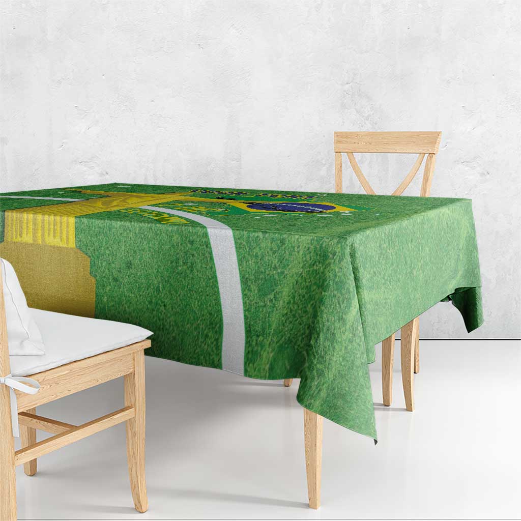 Green tablecloth draped over dining table with Brazil map and flag print