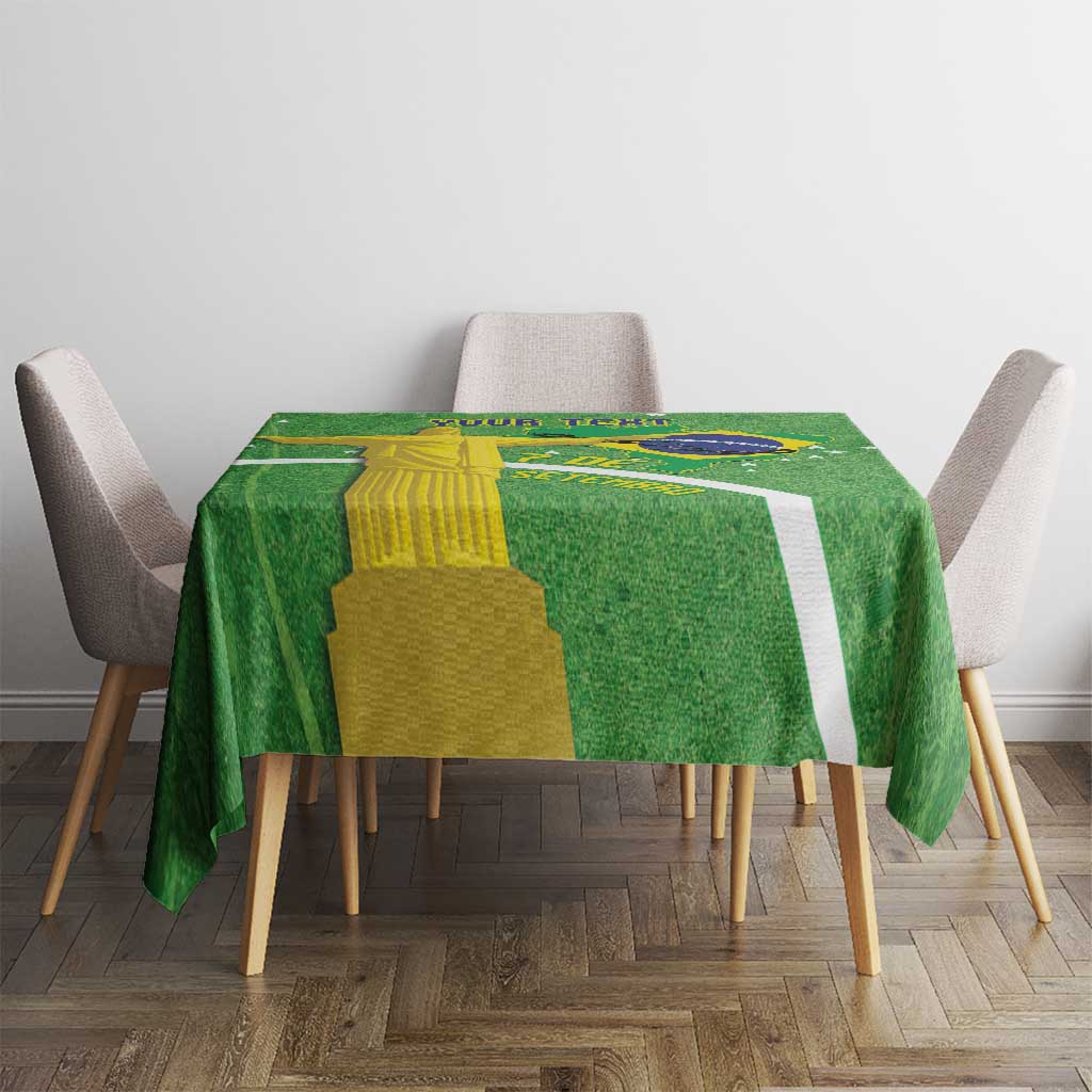 Green tablecloth on dining table with Brazil map and flag design across center