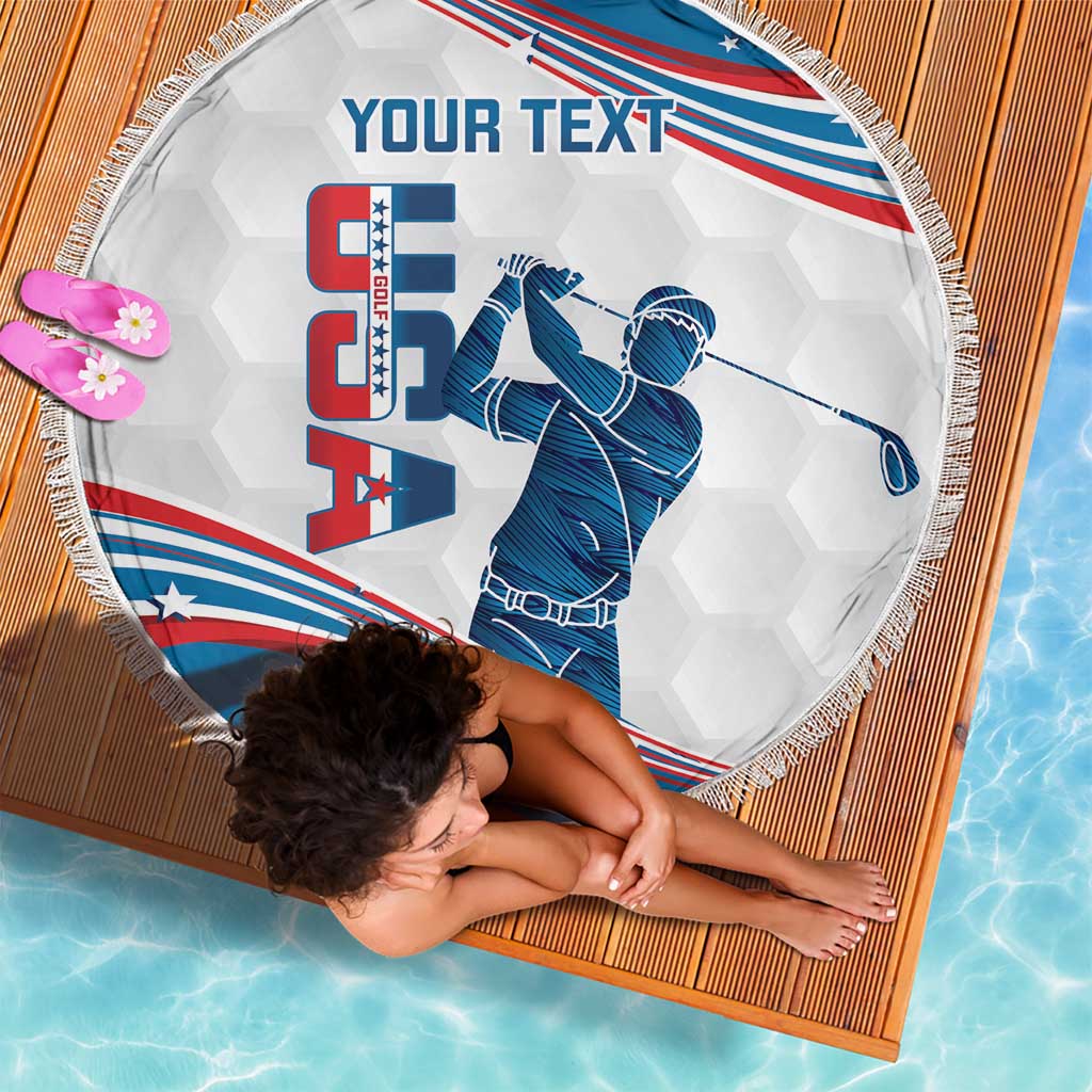 Round beach blanket with fringe, blue golfer graphic over USA flag stripes