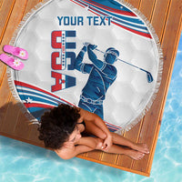 Round beach blanket with fringe, blue golfer graphic over USA flag stripes
