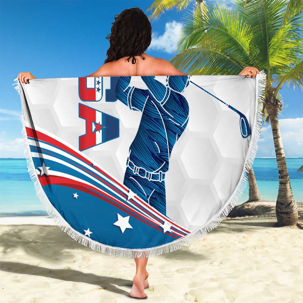 Round beach blanket with fringe, blue golfer graphic shown on fully spread blanket