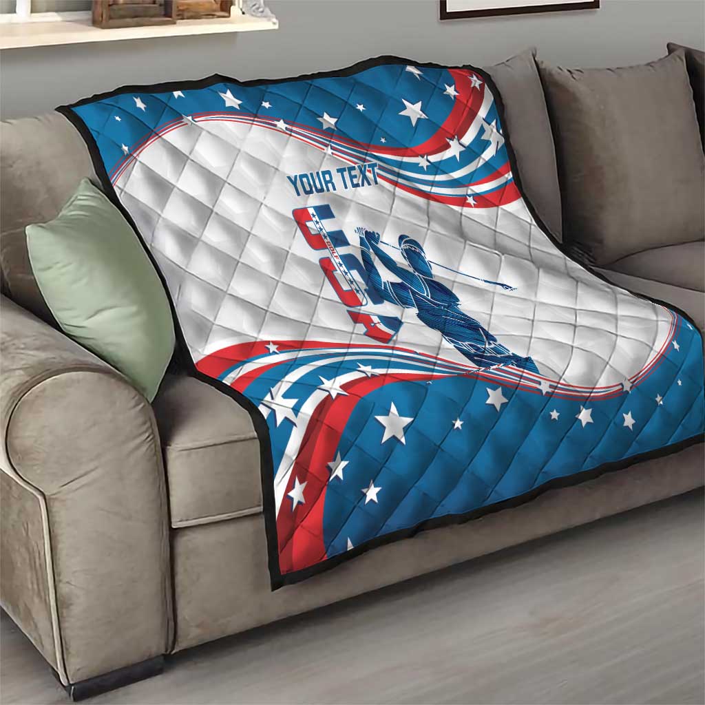 Personalized quilt draped on sofa, curved USA flag design in blue and red