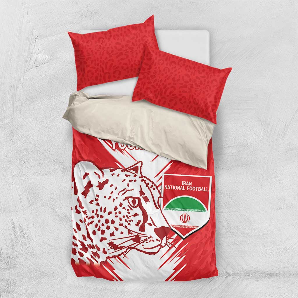 Red bedding set flat lay with lion head design, “YOUR TEXT,” and team crest on duvet
