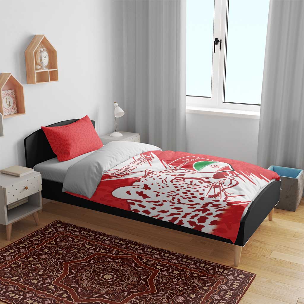 Red football bedding set on bed with duvet cover showing lion head, “YOUR TEXT,” and crest