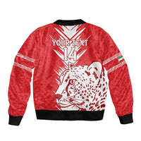 Red bomber jacket with black trim and leopard-face graphic on back