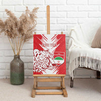 Red canvas wall art with leopard head artwork and shield emblem on wooden easel
