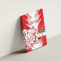 Red and white canvas wall art with leopard head illustration and shield emblem
