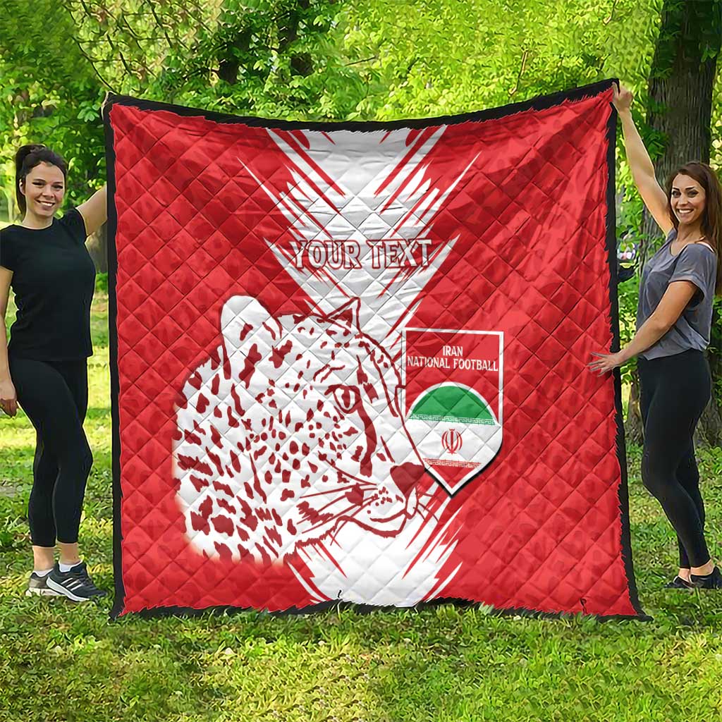 Red quilt blanket outdoors with white team emblem, leopard silhouette, and "Your Text"
