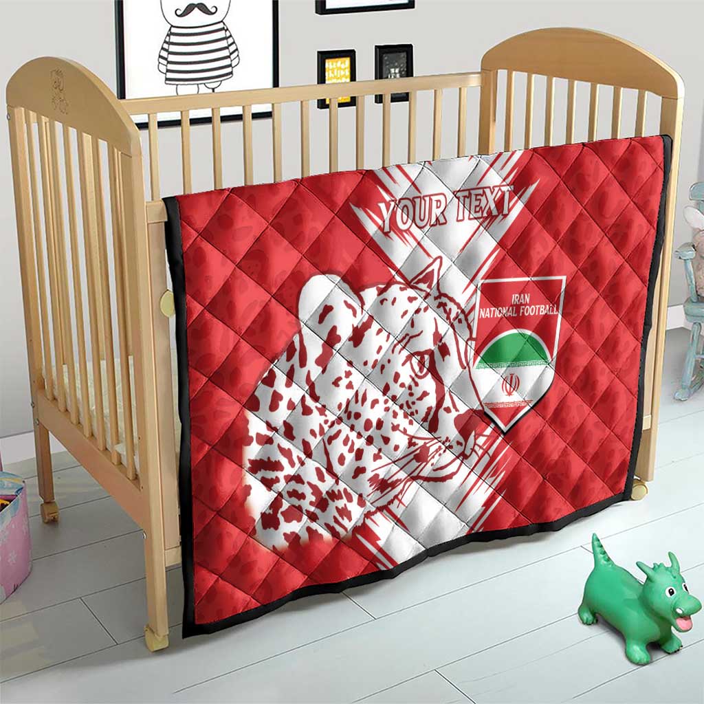Red baby quilt with white burst design, leopard silhouette, and "Your Text"