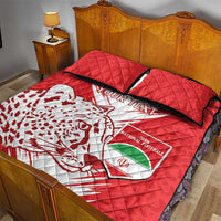 Red quilt bed set with 2 pillowcases, white emblem and brush-stroke design