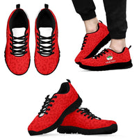 Red leopard-pattern sneakers with black sole and black laces, on-foot view and pair