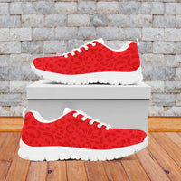 Red leopard-pattern sneakers with white sole and lace-up design, shown on white box