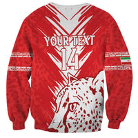 Unisex red crewneck sweatshirt back with white lightning V rays and eagle/leopard graphic