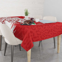 Red tablecloth with white lightning streaks and leopard spots pattern