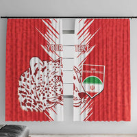 Red window curtains featuring white leopard pattern and Iran national football shield on each panel.