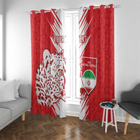 Red window curtains with white leopard design and Iran football shield, with small side table.
