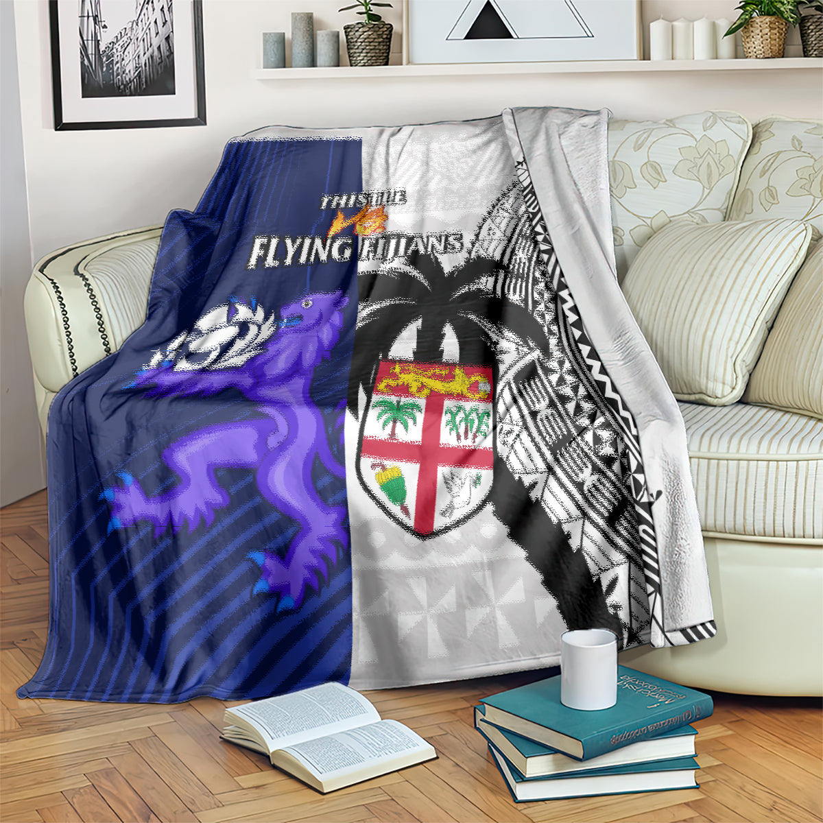 Rugby blanket with blue lion graphic, white geometric textures, black tribal pattern and crest