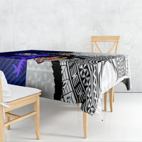 Rugby tablecloth draped on rectangular table, blue and black geometric tribal pattern