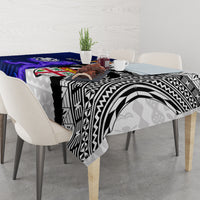 Rugby tablecloth on dining table with blue and white tapa-inspired black-and-white motifs