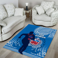 Blue rugby area rug with Samoa crest and player silhouette, bold geometric trim