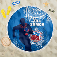Blue circular beach blanket with fringe edge, Toa Samoa rugby crest and player silhouette