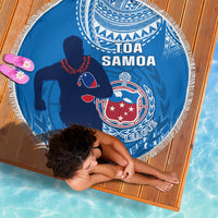 Blue circular beach blanket with fringe, Toa Samoa text, crest and rugby player silhouette