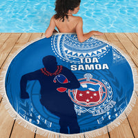 Blue circular beach blanket with fringe, Toa Samoa rugby crest and player silhouette graphic