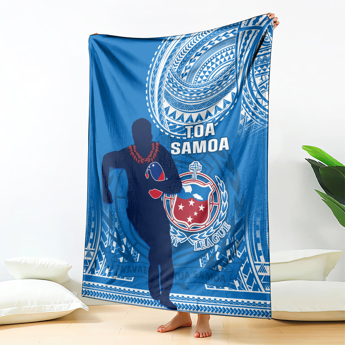 Blue rugby blanket with white Polynesian patterns and Tofa Samoa logo in the center